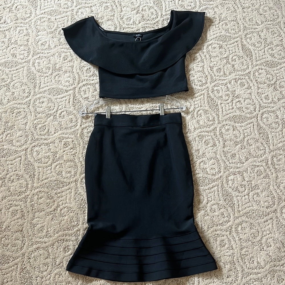 Black 2 piece set. With skirt and crop top ruffle